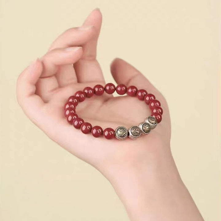 Rotes Zinnober Armband 925 Silber Perlen Handgelenk getragen elegant
