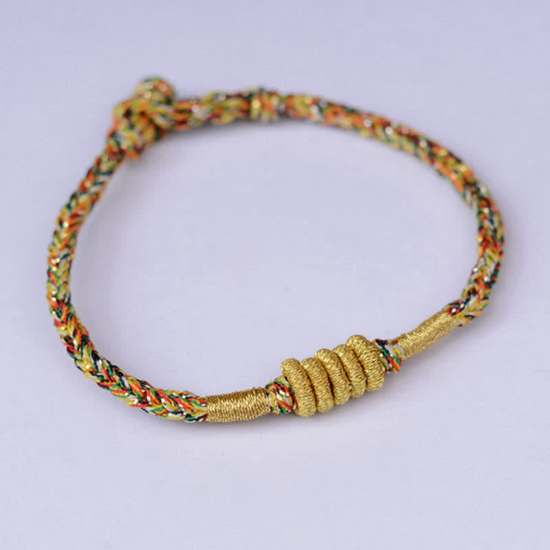 Buntes geflochtenes Armband mit goldenem Knoten Schutz Handgelenk