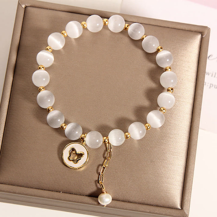 Armband Schmetterling – Liebe Energie weißer Mondstein elegant golden