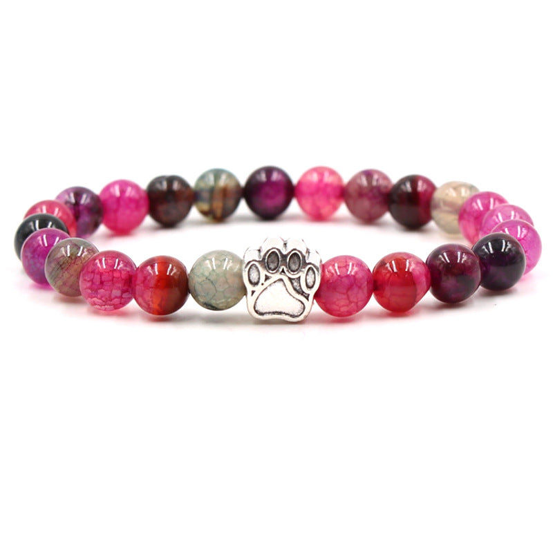 Armband Achat – Ruhe mit rosa Natursteinen und Pfotensymbol Charm.