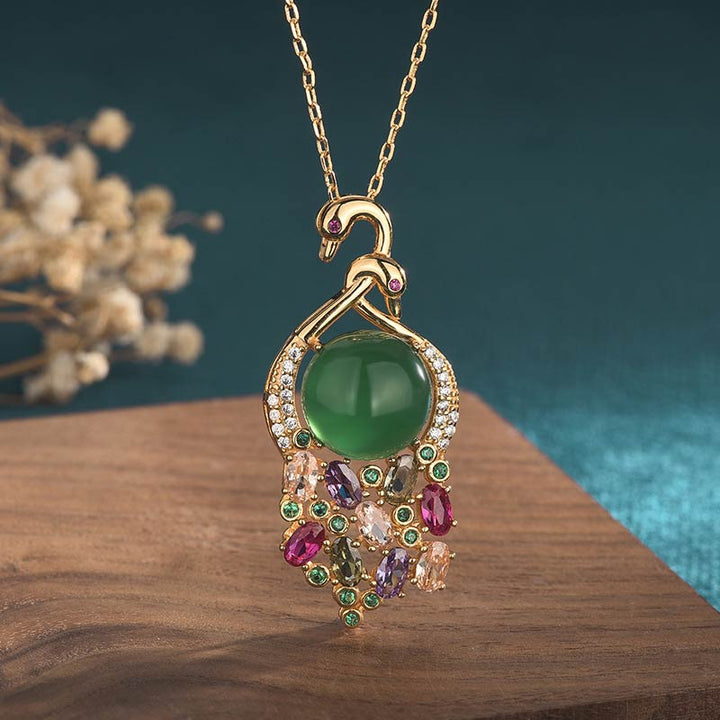 Anhänger Kette Cyan Jade Pfau Erfolg