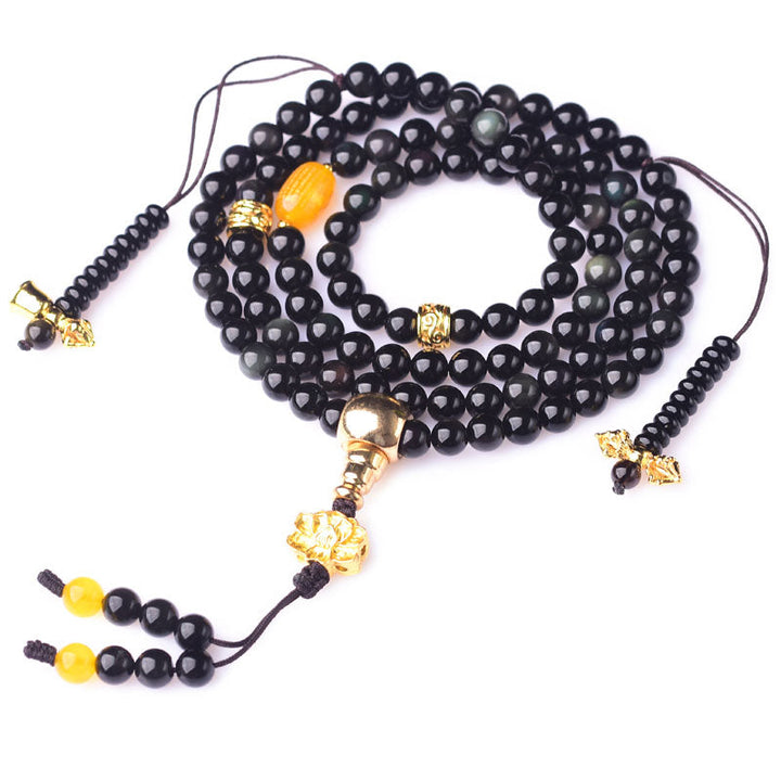 Armband Schwarzer Obsidian Lotus mit goldenen Perlen Anhänger