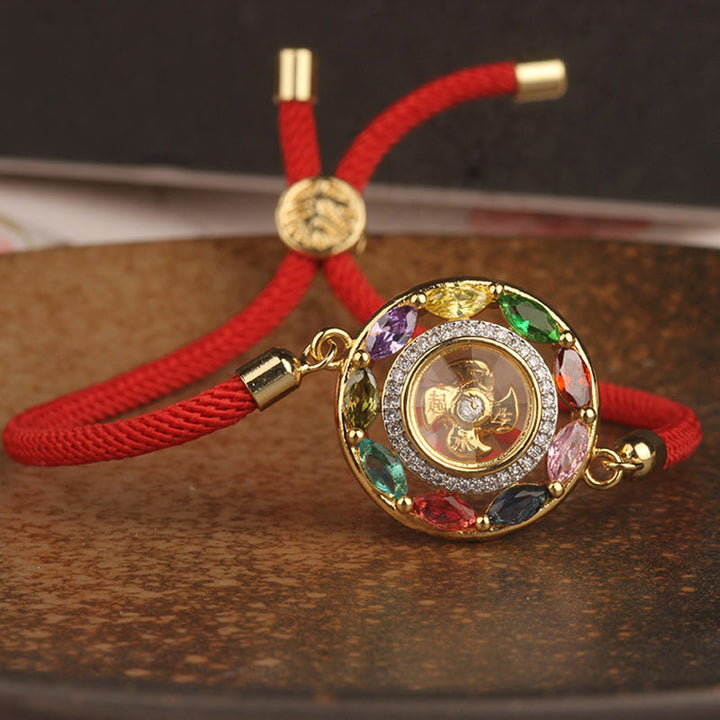 Armband Kupfer – Glück & Wohlstand rotes Seidenband Natursteine Flachaufnahme