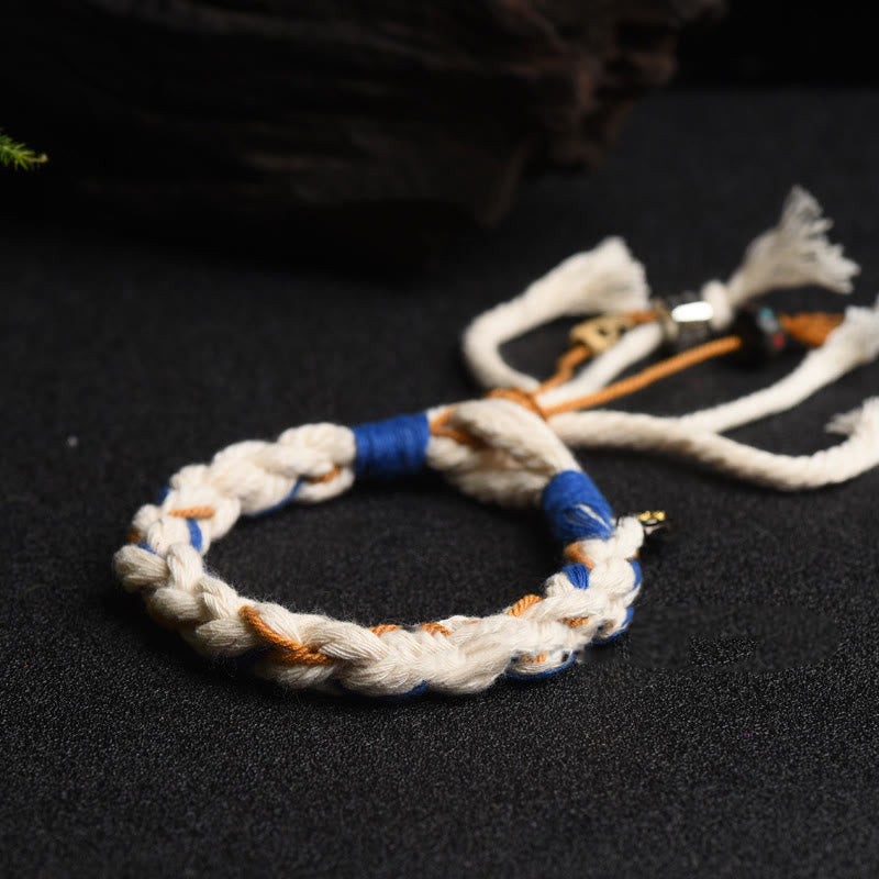 Armband – Glück & Wohlstand & Stärke mit weißem Seil und blauen Perlen