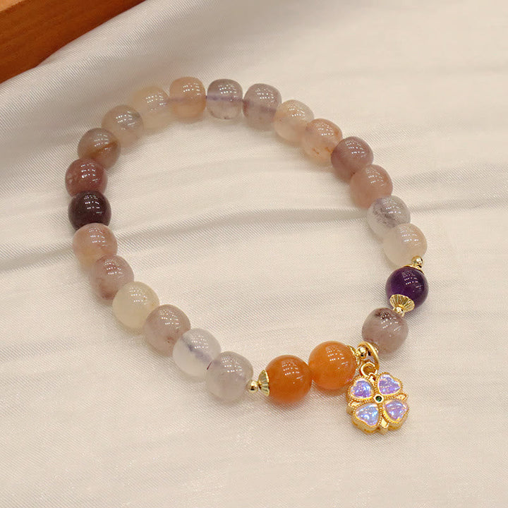 Jade Armband mit Amethyst und Citrin Perlen Blütenanhänger elegant.