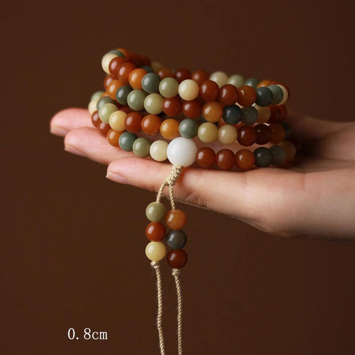 Mala Bodhi – Harmonie Armband mehrfarbige Perlen Naturstein am Handgelenk getragen