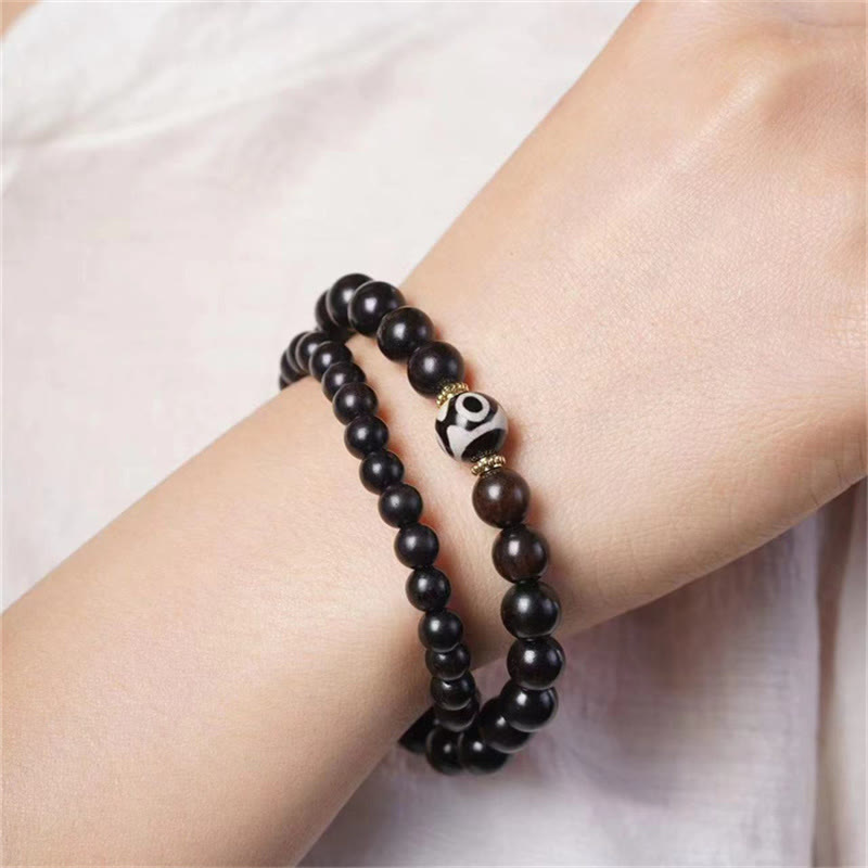 Armband Ebenholz Dzi – Balance & Schutz