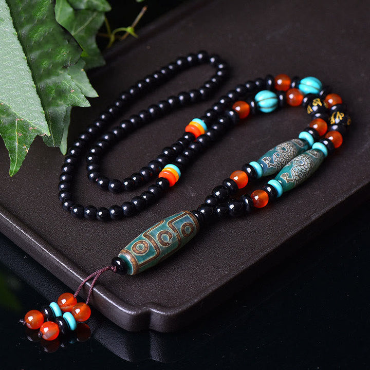 Anhänger Dzi Neun-Auge Tibet Obsidian Kette Schutz