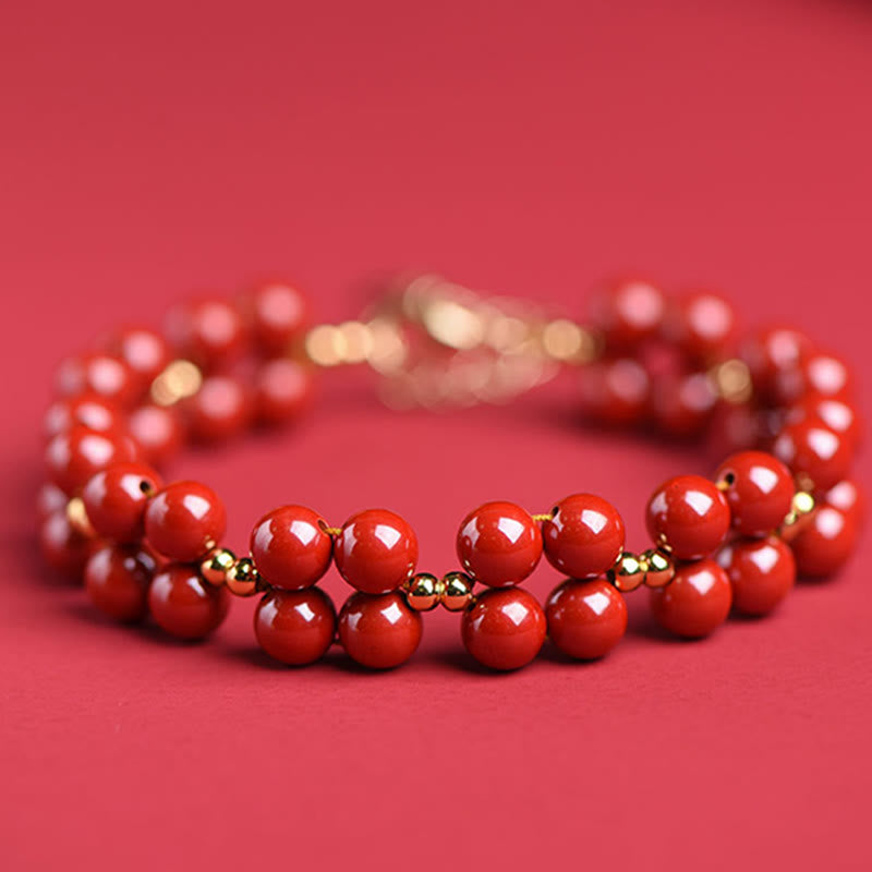 Armband Zinnober – Segen Harmonie rote Perlen Naturstein elegant glänzend