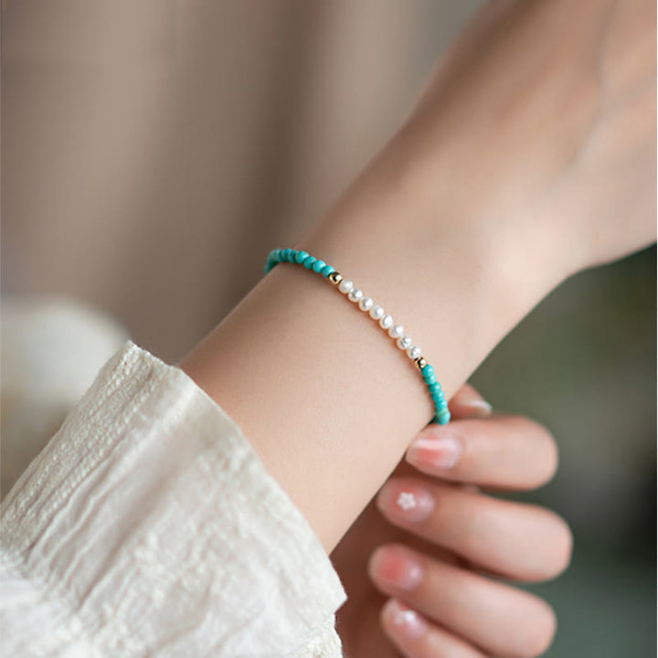 Türkis Perlen Armband 925 Silber elastisch am Handgelenk getragen