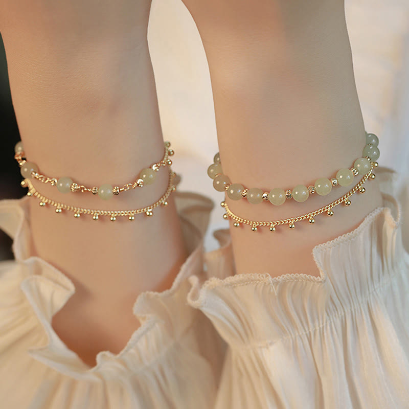 Jade Armband Glück Wohlstand Harmonie goldfarbene Perlen elegant getragen