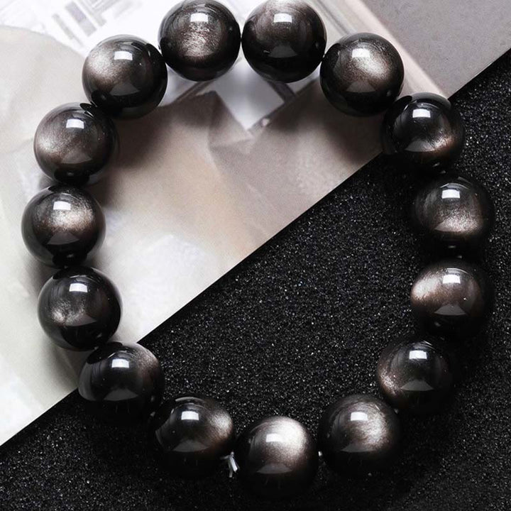 Obsidian Armband Silber Obsidian – Schutz schwarze glänzende Perlen Flachlage