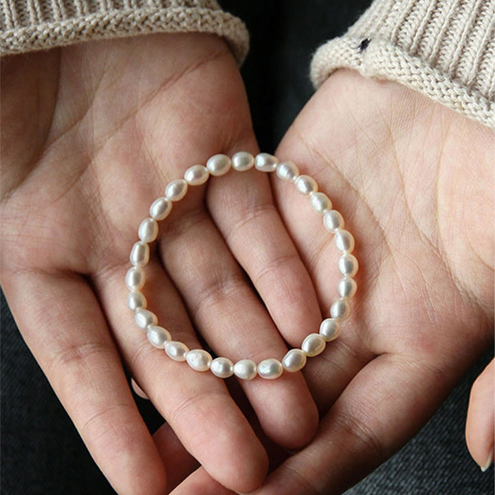 Armband Perle – Heilung weiße Perlen elastisch Handgelenk getragen
