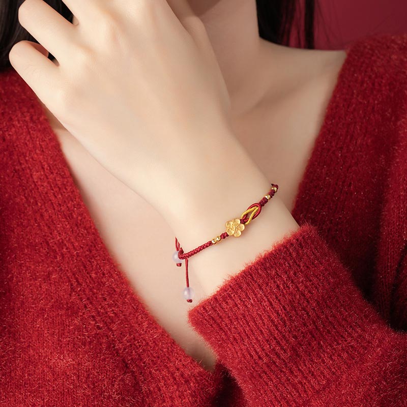 Rotes Armband 925 Silber – Glück mit goldenem Anhänger Handgelenk