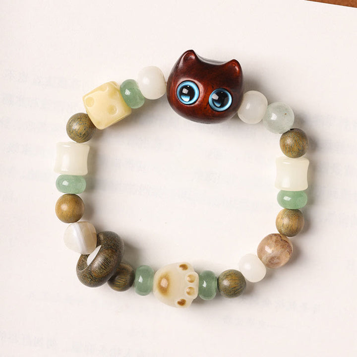 Armband Sandelholz Bodhi Katze Frieden Naturstein Perlen elastisch handgefertigt