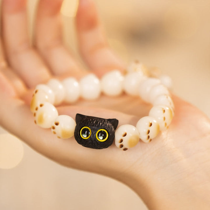 Armband Sandelholz Bodhi Katze schwarze Katze gelbe Augen Glück Liebe
