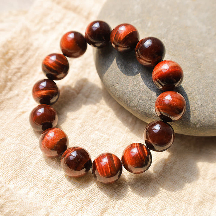 Armband Tigerauge – Heilung & Energie rotbraune Kugeln glänzend elastisch