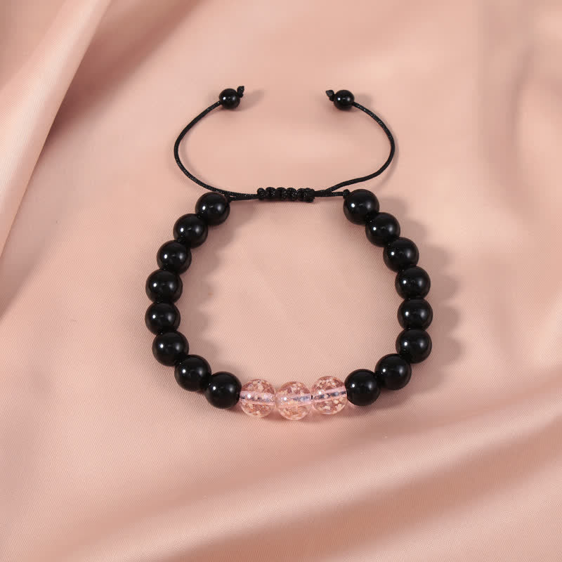 Armband Schwarzer Obsidian – Stärke mit rosafarbenen Kristallperlen elegant.