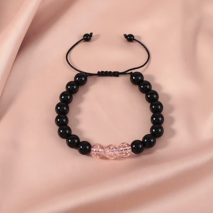 Armband Schwarzer Obsidian – Stärke mit rosafarbenen Kristallperlen elegant.