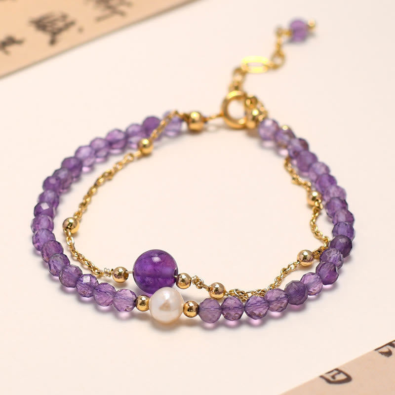Amethyst Kristall Armband mit Perle und Goldkette elegant.
