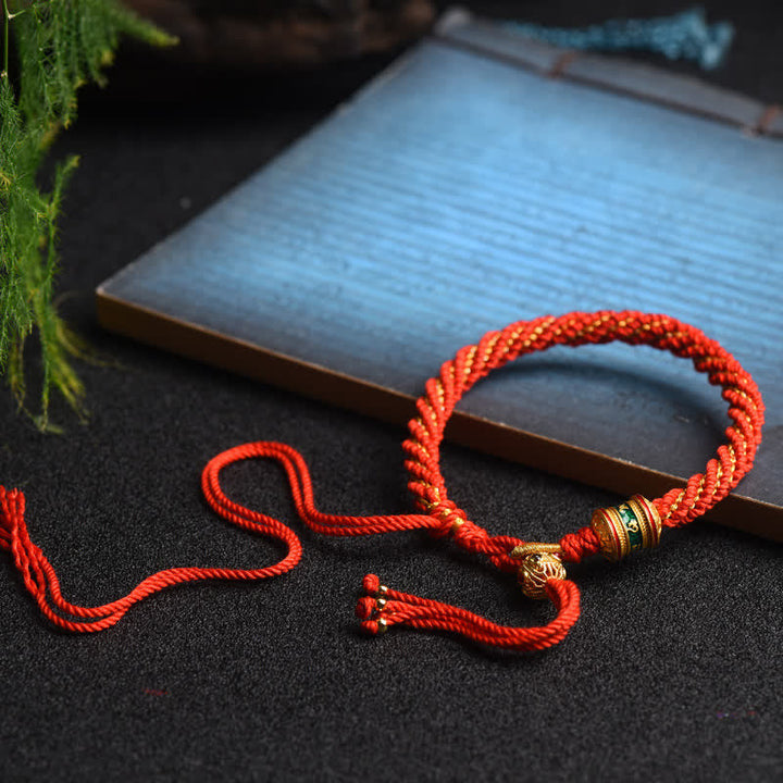 Rotes Tibet Gebetsarmband mit goldenen Perlen Glück Armband