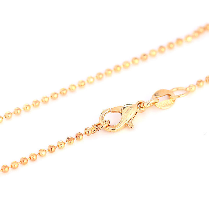 Goldene Kugelkette mit Karabiner Verschluss Schmuck Nahaufnahme