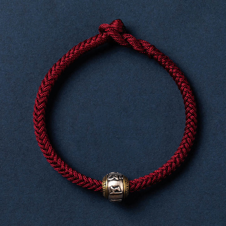 Rotes geflochtenes Armband mit silbernem Om Mani Padme Hum Anhänger