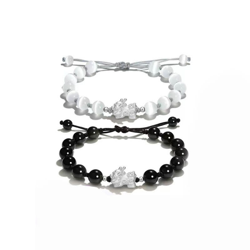 Zwei elastische Armbänder mit schwarzem Obsidian und Pixiu Kristall Anhänger.