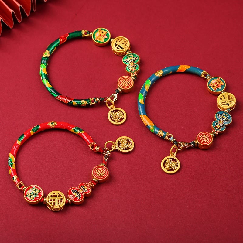 Armband – Glück & Wohlstand Energie in bunten Farben mit goldenen Münzen.