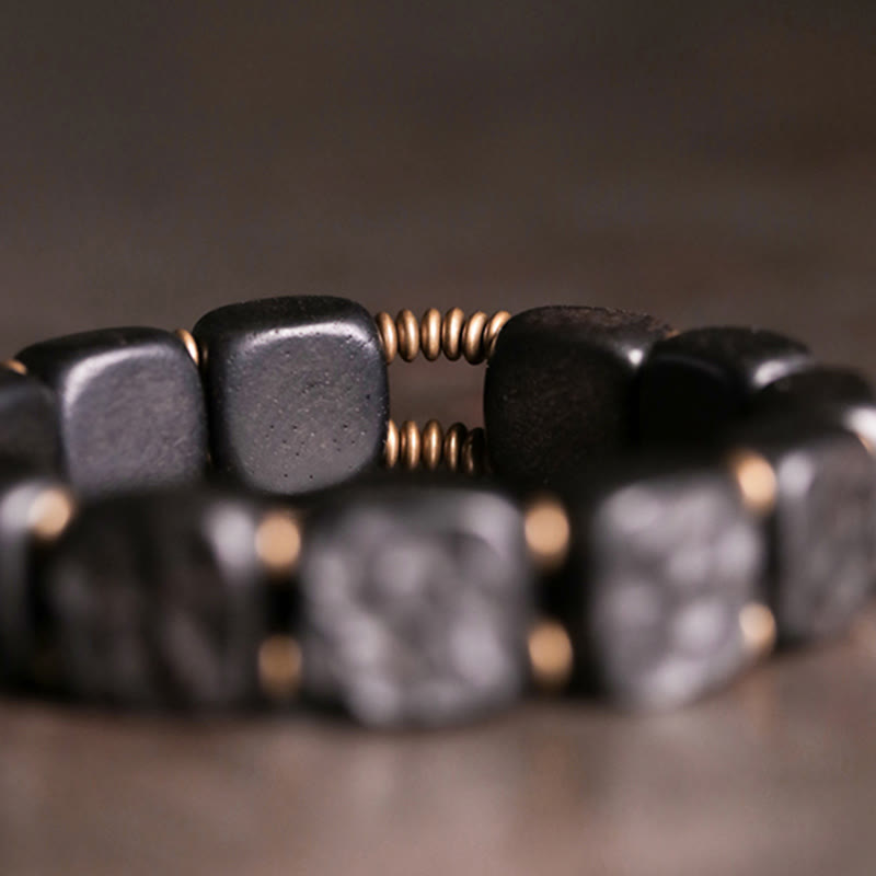 Armband Kupfer Ebenholz – Frieden & Balance schwarze Perlen elegant getragen