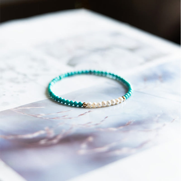 Türkis Perlen Armband elastisch getragen Naturstein Schmuck elegant