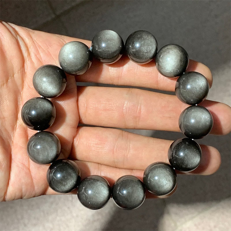Obsidian Armband Silber am Handgelenk getragen grauer Naturstein elastisch