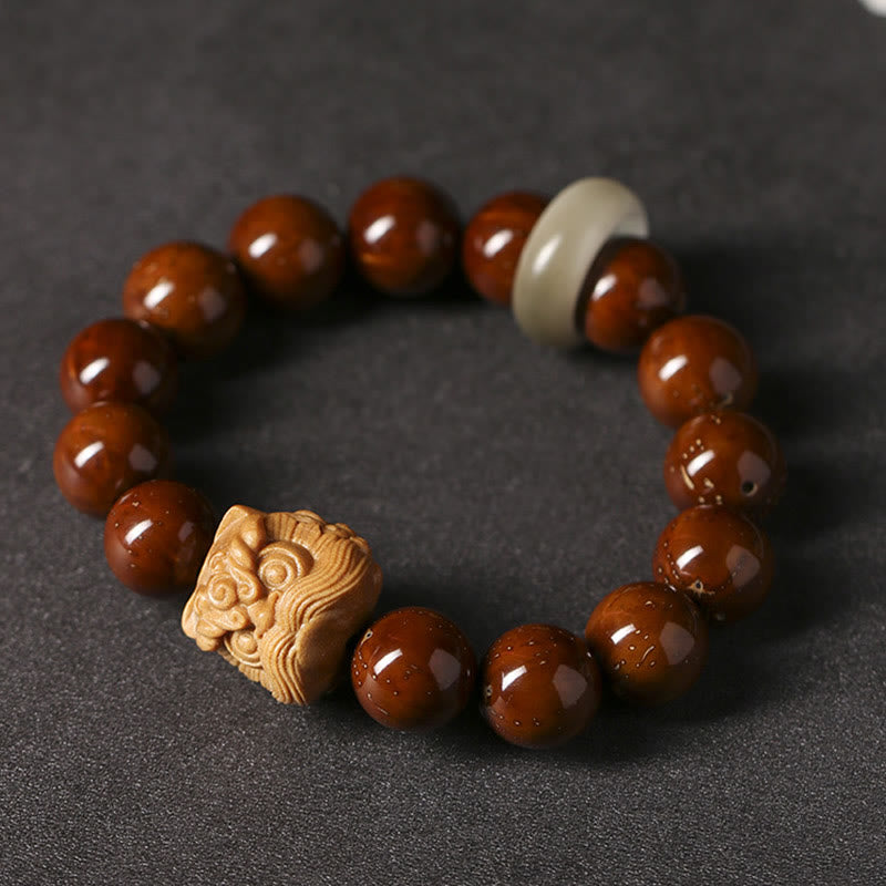 Armband Bodhi Samen Tanzendes Löwe Holzperlen Naturstein elastisch