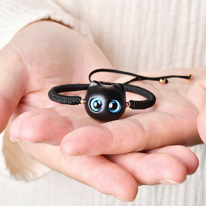 Armband Ebenholz Katze – Frieden schwarzes Katzenauge Schnur elastisch