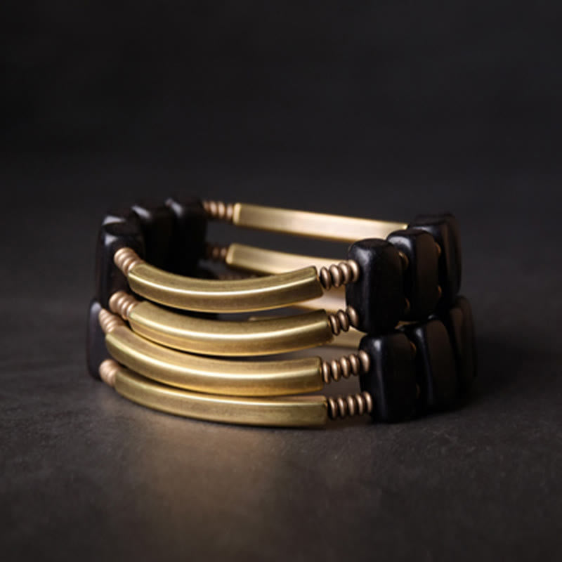 Armband Kupfer Ebenholz Balance Energie schwarze Perlen elegant glänzend