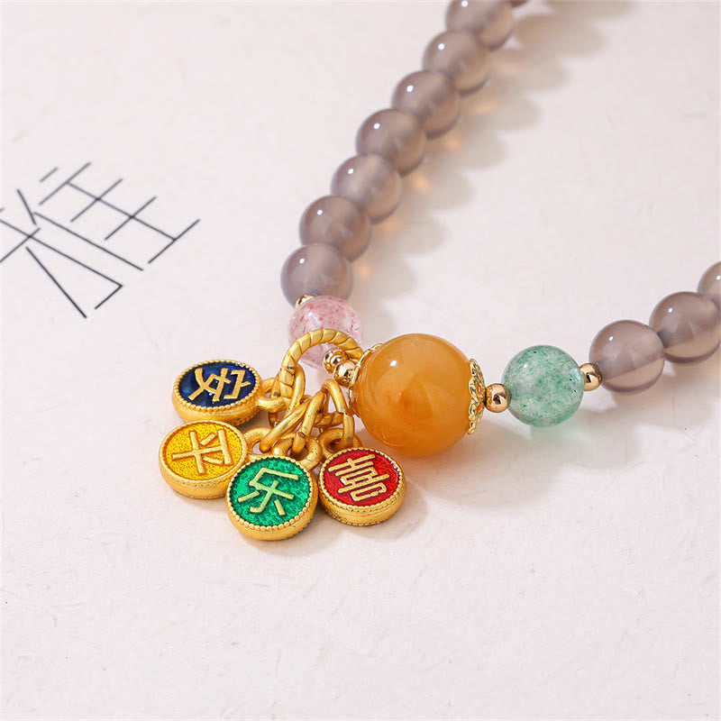 Armband Achat mit goldenen Charms Naturstein Perlen elastisch.