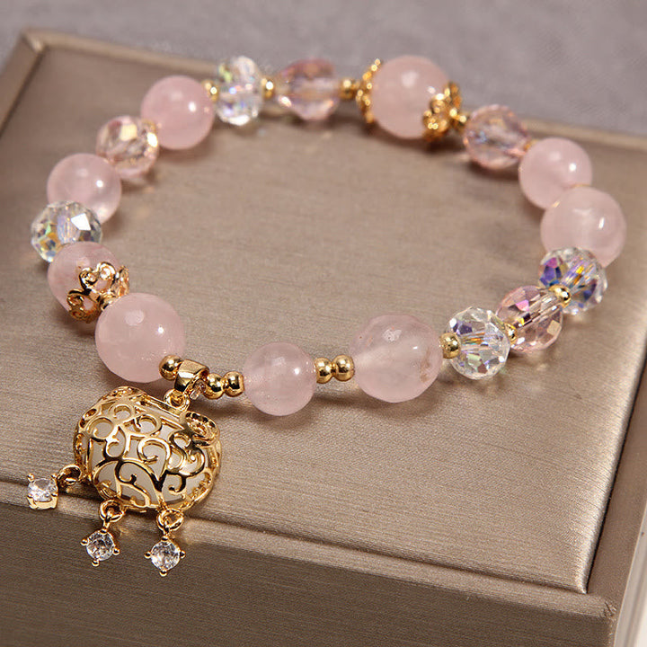 Armband Kristall – Schutz Rosenquarz Gold Perlen elegant glänzend