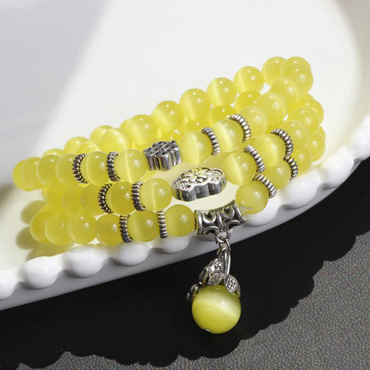 Gelbes Katzenauge Armband PiXiu Dreifach mit Silberverzierungen elegant.