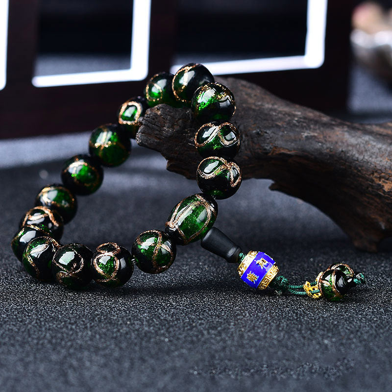 Grünes Achat Armband mit Drachenmotiv Heilung elastisch getragen