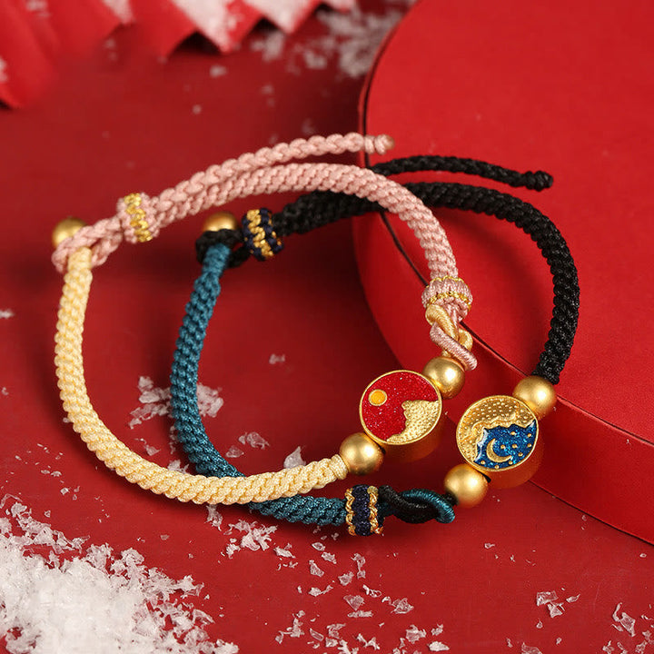 Armband Paar – Glück in Rot und Schwarz mit goldenen Perlen.