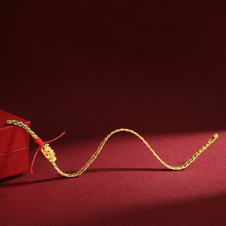 Rotes Armband Drachen – Erfolg & Energie goldene Schnur elegant.