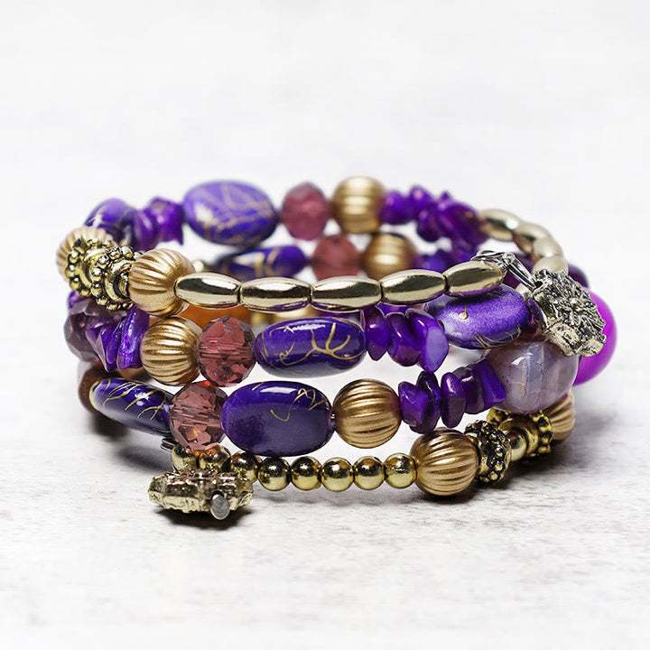 Lila Achat Armband mit goldfarbenen Perlen und Leoparden-Charms elastisch