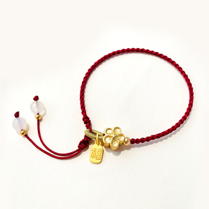 Rotes Armband Pfirsichblüte Glück Energie Gold Charms elastisch verstellbar