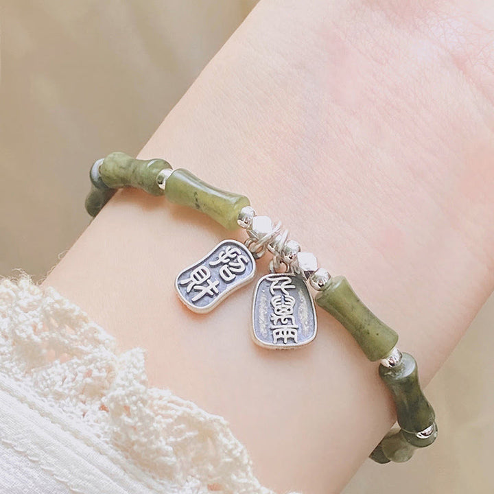 Jade Armband 925 Silber Fu-Zeichen Glück Fülle am Handgelenk getragen