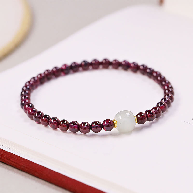 Armband Granat Jade elastisch mit weißer Jade Perle Naturstein