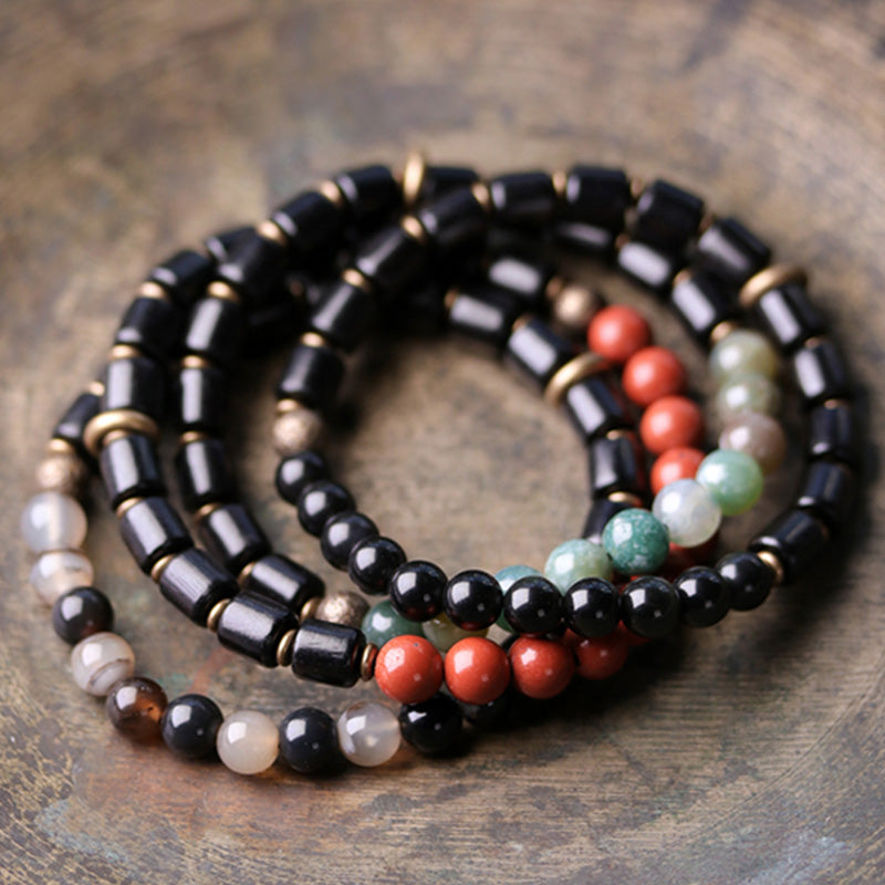 Schwarze Obsidian Armband Kristall Kupfer elastisch Naturstein elegant.