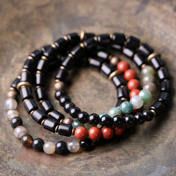 Schwarze Obsidian Armband Kristall Kupfer elastisch Naturstein elegant.