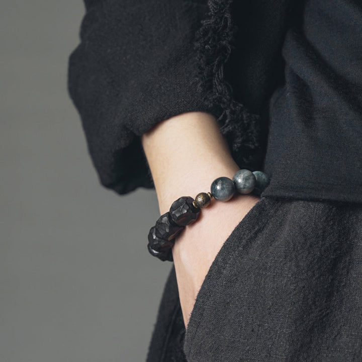 Armband Kupfer Ebenholz Paar schwarze Natursteine Handgelenk getragen