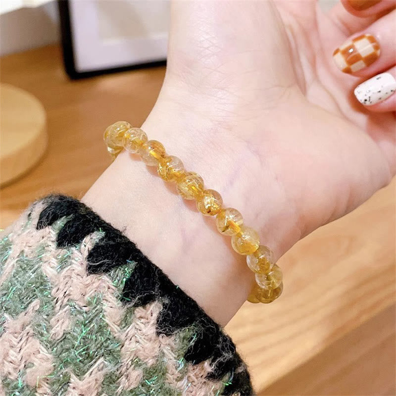 Bernstein Armband – Wohlstand & Stärke am Handgelenk getragen facettiert