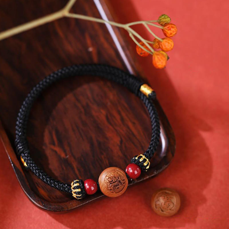 Armband Zinnober Chinesisches Tierkreis Wohlstand schwarze Kordel Perlen